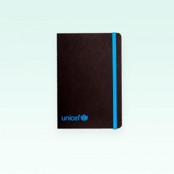 Cuaderno o libreta UNICEF tamaño A6, cierre por goma