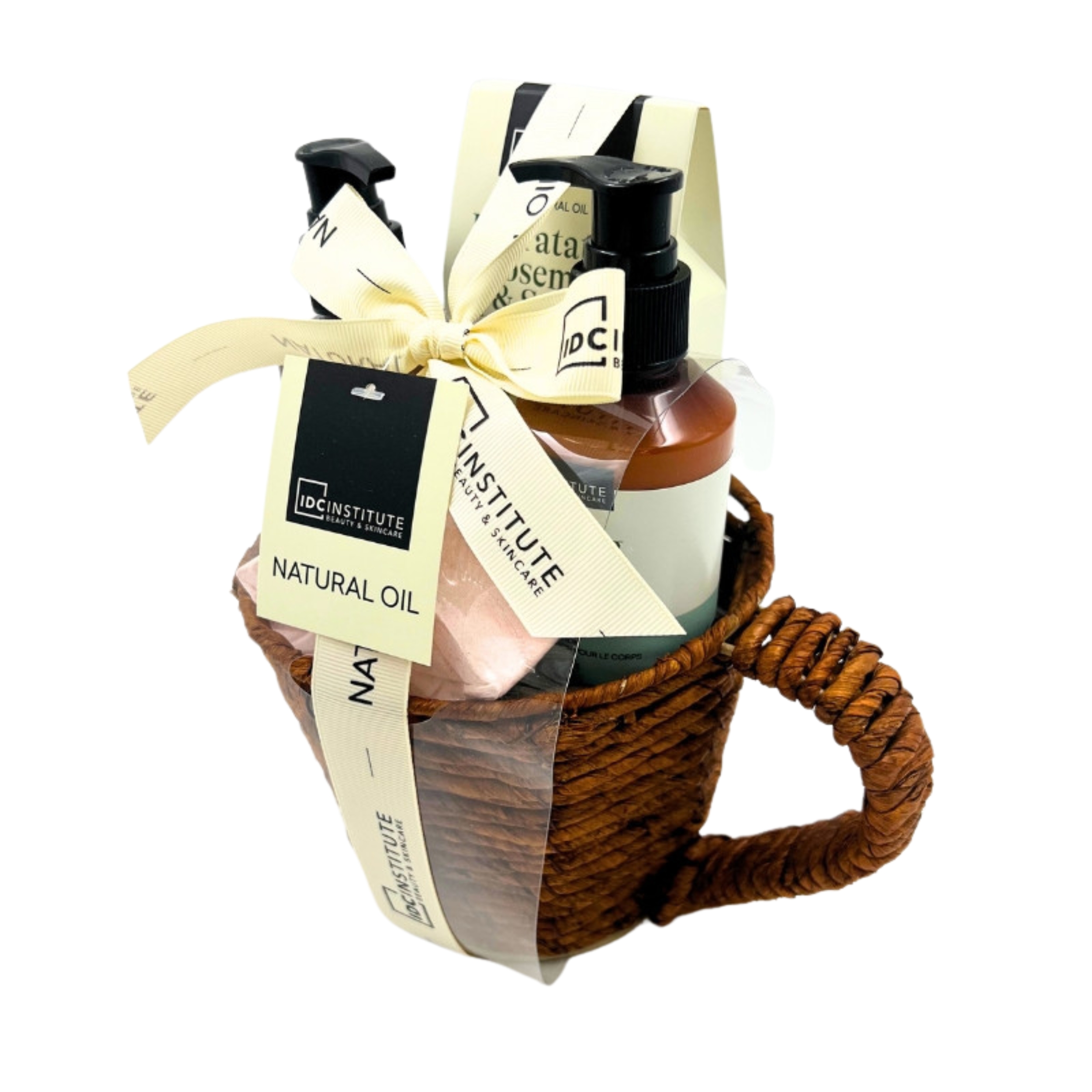 Imagen de cesta de mimbre pequeña en marrón con productos de la marca IDC Natural Oil image number null